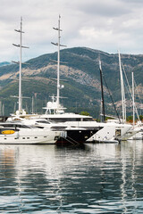 Fototapeta premium Marina with yachts and hilly landscape.