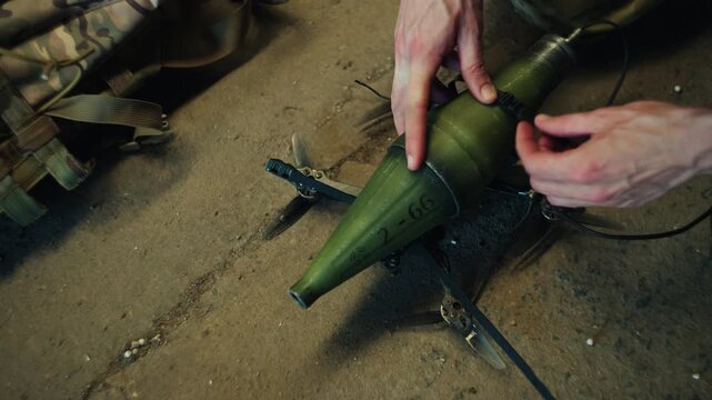 Kamikaze military drone with RPG explosive is being set up