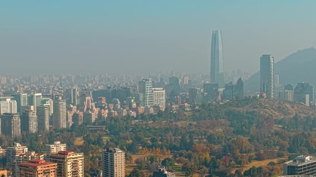 Aerial Establishing of Modern Skyscrapers and Urban Park in Las Condes Business District Santiago de Chile