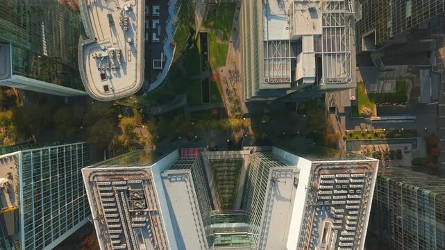 Aerial Top Down of Las Condes Skyscrapers Heliports and Araucano Park in Santiago Chile