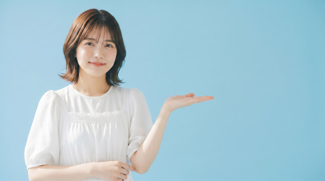 Friendly beauty expert explaining ingredients of a moisturizing cream to an eager client