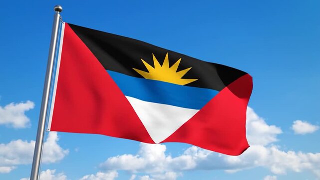 The flag of Antigua and Barbuda waving in the blue sky