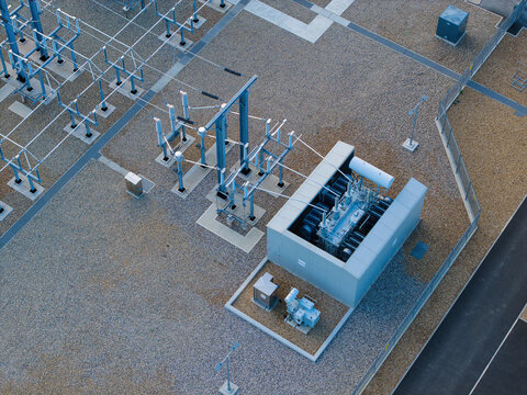 Aerial view of the Biggleswade National Grid 400132kV Substation with high-voltage electrical transformers and switchgear in Biggleswade, England, United Kingdom.