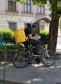 Glovo Courier Delivering Food In Lviv Ukraine