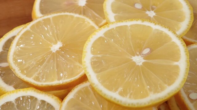 Juicy lemon slices close-up, for background, fruits