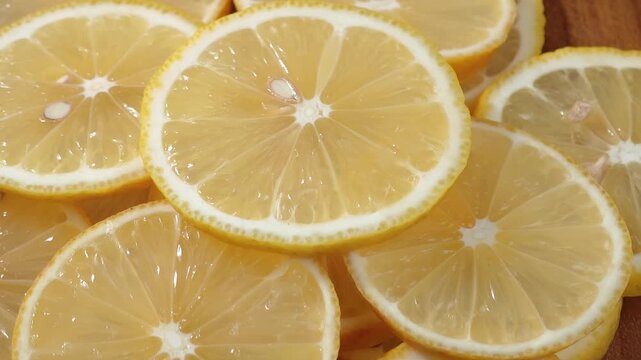 Juicy lemon slices close-up, for background, fruits