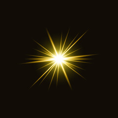 Fototapeta premium Radiant golden starburst on black