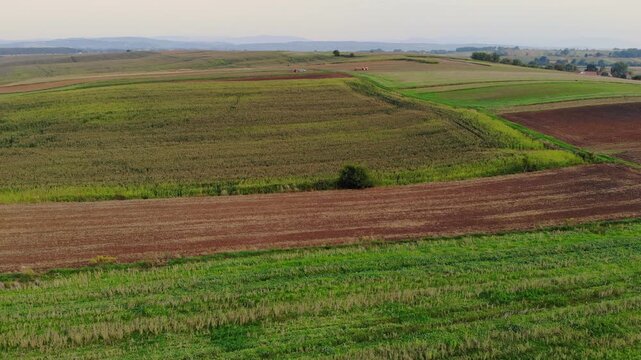 Aerial High Angle of Patchwork Farmland and Agricultural Green Fields in Southern Poland