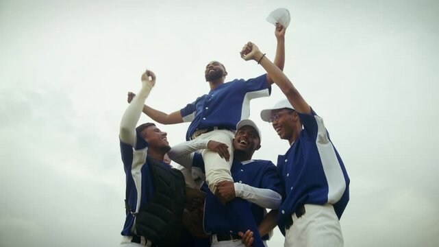 Victorious baseball team celebrating their triumph on the field. Players lift a teammate in joy, showcasing teamwork and success after a hard-fought game. Cheers erupt.