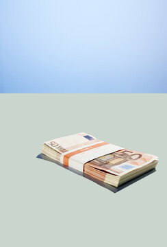 Bundle of fifty euro banknotes representing finance and wealth