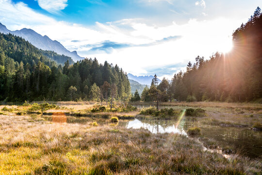 Sunset over Riedener See wetland in the Austrian Alps
