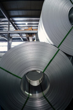 Metal sheet rolls at steel mill