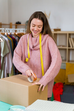 Smiling clothing designer packaging cardboard box for shipping