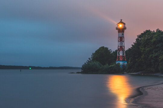 Germany, Hamburg, Rissen lighthouse at dusk