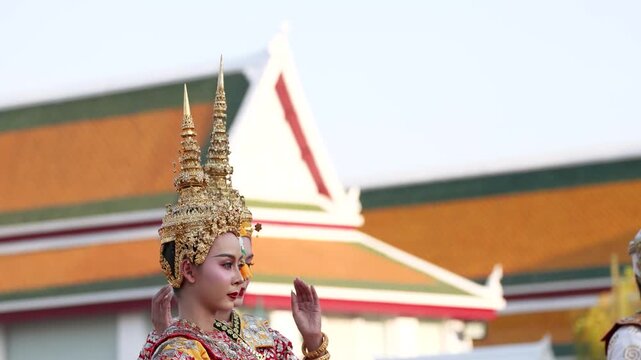 Thai Classical Dancer in Traditional Chada Headdress at Temple