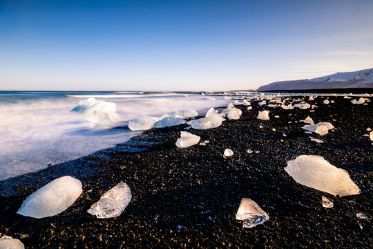 Ice chunks on the black volcanic sand of Diamond Beach
