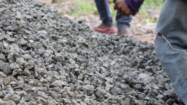 Pile of Crushed Stones with Shovel at Construction Site