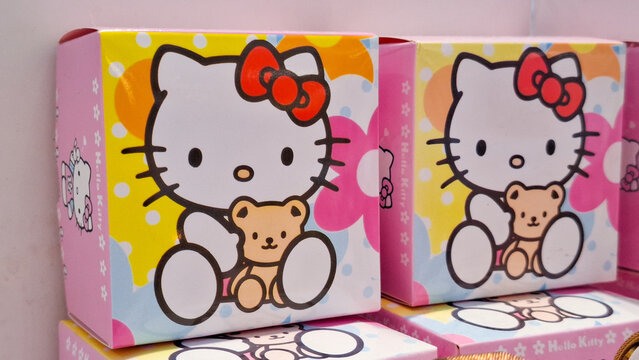 Cute Sanrio Hello Kitty cartoon cat merchandise boxes with ribbon bow and teddy bear illustration graphics on June 13, 2026 in Bangkok, Thailand