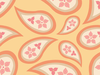 Fototapeta premium seamless pattern classic paisley motifs decorated with cute pink flowers inside. Designed in a soft vintage style with a bright,warm color palette of peach orange, cream yellow, light pink, and beige.