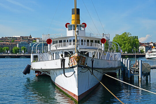 Geneva, Switzerland, Europe - 05.2026 : Cruise steamboat moored in Geneve Mont-Blanc port, fleet of Lake Geneva General Navigation Company - CGN, Swiss company operating ships on Lake Geneva 