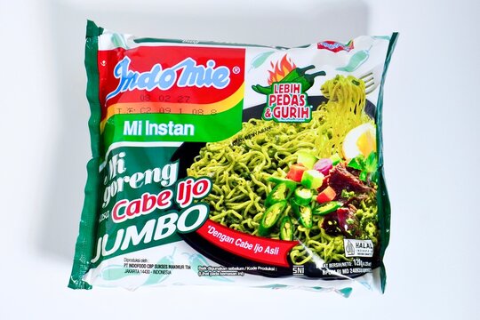 Jakarta, Indonesia - June 25th, 2026 - Indomie instant noodle with cabe ijo flavor packaging label isolated on horizontal white background.
