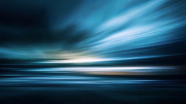 Blue defocused motion blur abstract widescreen background with soft light texture

