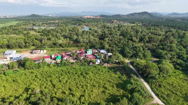 Aerial view of plantation, village and surrounding landscape at Kubang Semang.