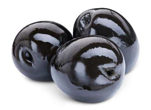 Organic three black olives close up. Black olives isolated on white background with clipping path