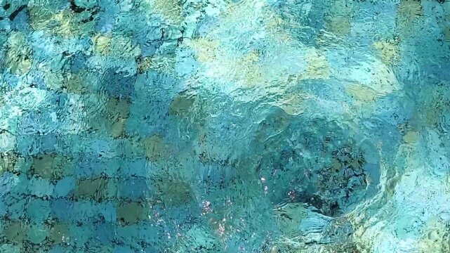 Abstract Pool Water Swirl Created by Underwater Bubbling Jet