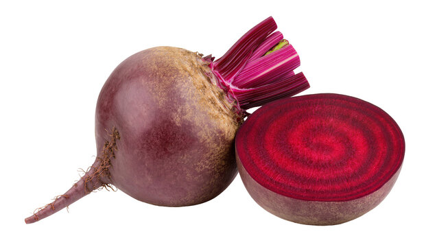 Isolated fresh raw beetroot with a sliced half showing vibrant red pulp on studio shot