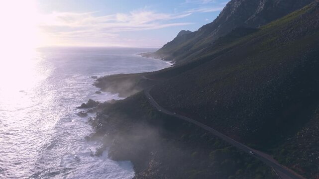 Aerial overhead waves breaking on the coastline