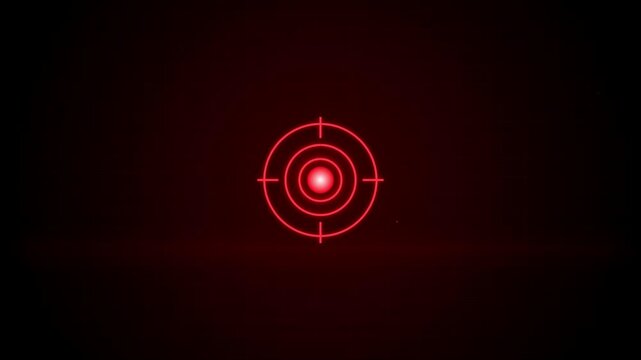 Red digital target reticle pulsing on a dark technical grid background