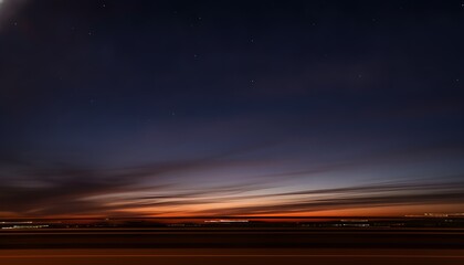 Naklejka premium Dusk-to-night sky transition motion blur
