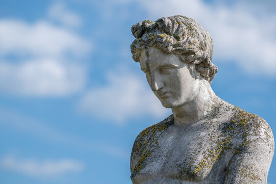 Stone statue of Apollo, the Greek god of light, music and prophecy.