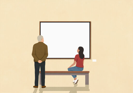 Senior man and young woman looking at art hanging on museum wall