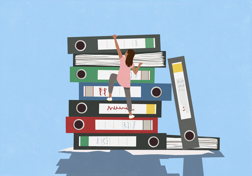 Woman climbing stack of file binders against blue background