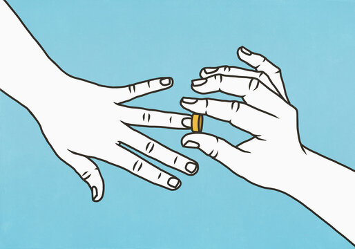 Hand placing wedding band on ring finger against blue background