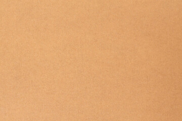 Fototapeta premium Brown kraft paper texture background with smooth recycled cardboard surface