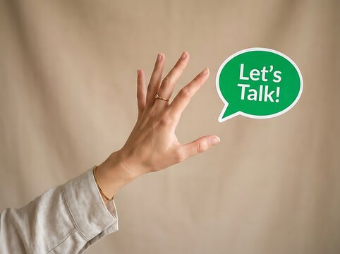 Hand Gesture with Lets Talk Speech Bubble.