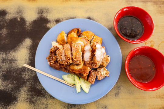 Lor bak Penang five-spice fried pork rolls with dipping sauce, Malaysian Chinese hawker food.