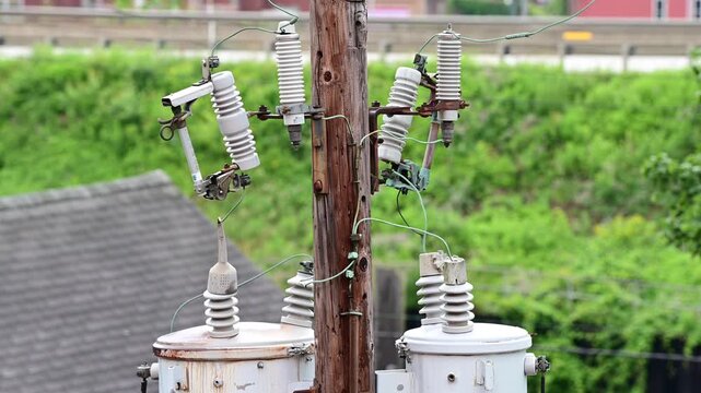 Energy lines, transformer, USA energy line domestic Us town, close up on lines generator, background selective focus video