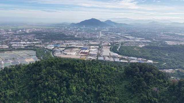 Aerial drone view of Kampung Sungai Semilang Juru and surrounding forest and industrial area