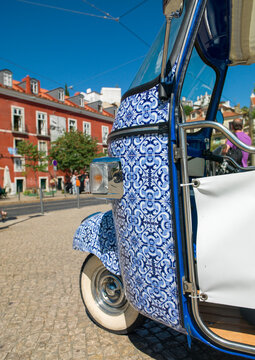 Tuk Tuk tour of Lisbon decorated with portuguese tiles, Lisbon district, Lisbon, Portugal