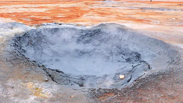 Boiling water in a mud spring in Hverir geothermal spring in Iceland