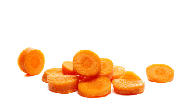 Carrot raw sliced in half, isolated on white background