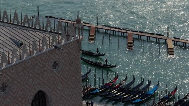 Slow Motion Gondolas Gliding Through Sunlit Venice Canal
