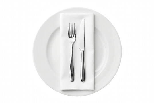 Elegant White Plate with Stainless Steel Knife and Fork on a Napkin