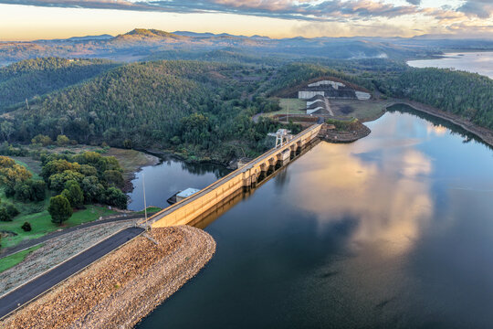 Aerial view showcasing the Lake Keepit dam wall and surrounding rural landscape, highlighting the scale of the reservoir, engineering infrastructure and tranquil lakeside setting in NSW, Australia.