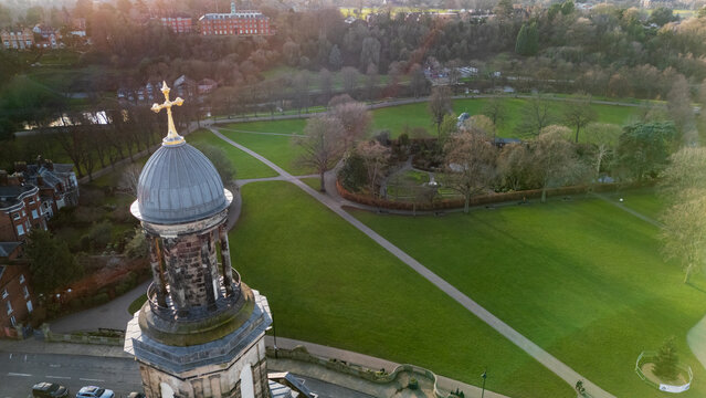 Close Aerial View of St Chad's Church Dome and Golden Cross Over Shrewsbury Skyline