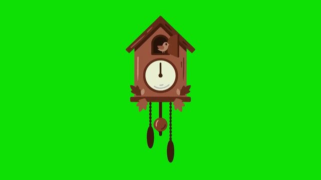 A traditional cuckoo clock hangs on a green background indoors.